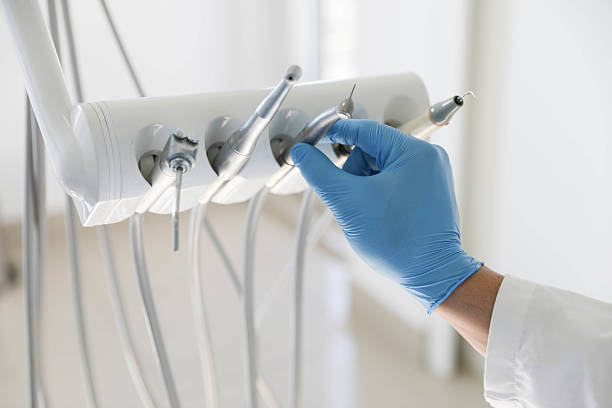 Professional Invisalign Clear Aligners technician working in South Valley Stream, NY